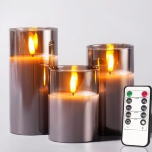 a group of candles with remote control